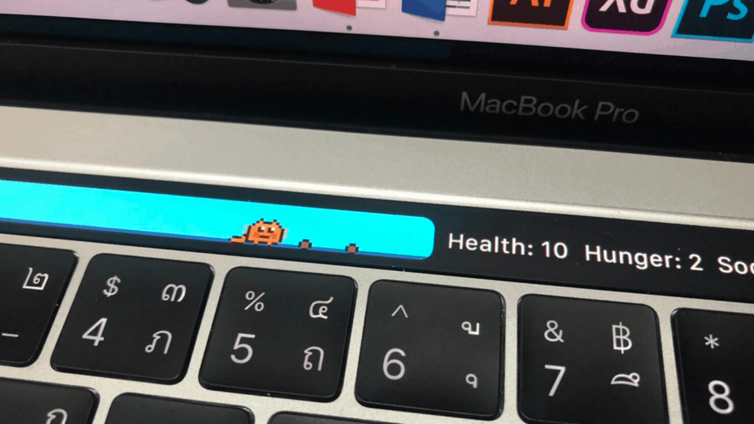 Touchbar Pet คืออะไร ? MacBook Touch bar สามารถเลี้ยงสัตว์ได้อย่างไร